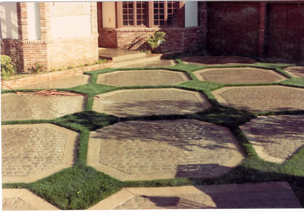 Waypoint Concrete formed a geometric concrete grid with grass infill for a unique courtyard in Boise, Idaho.