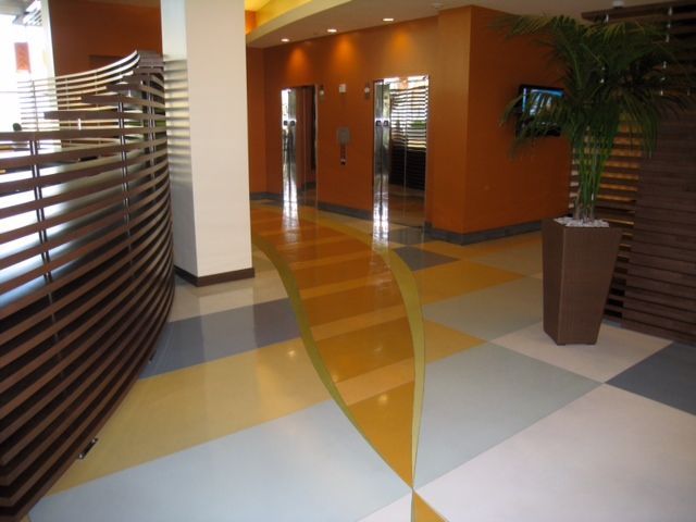 Waypoint Concrete completed a modern concrete floor with stained and scored detail in a lobby in Kuna, Idaho.