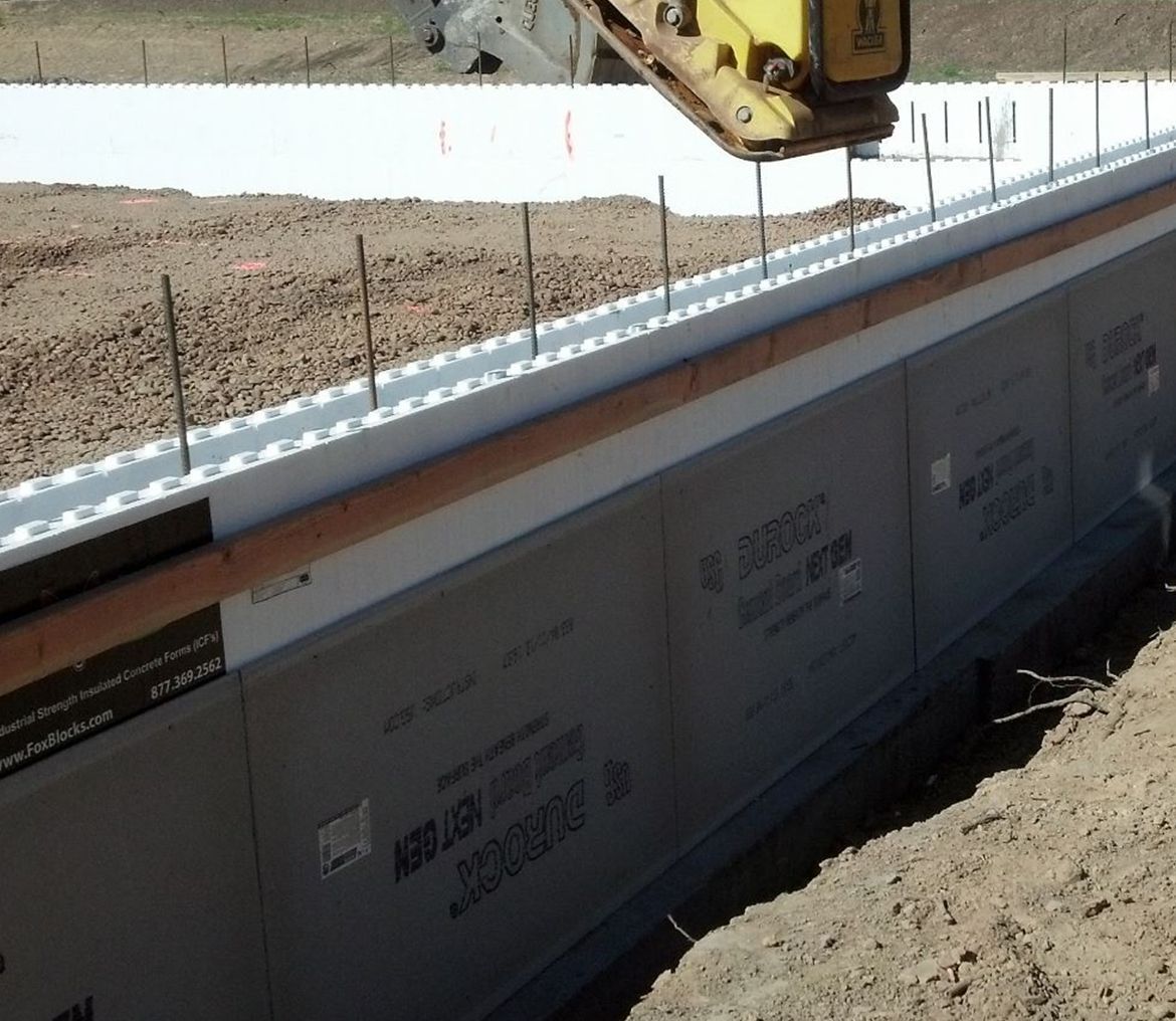 Waypoint Concrete installed commercial-grade vapor barrier below slab foundation in Emmett, Idaho.
