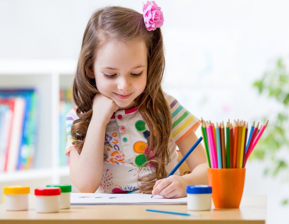 Cute Little Preschooler Child Drawing At Preschool — Grandma Rosie’s Quality Long Day Care In Wollongong, NSW