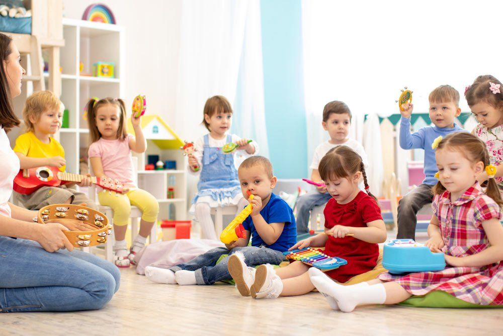 Little Children Engaged In Playdough Modeling At Daycare — Grandma Rosie’s Quality Long Day Care In Wollongong, NSW