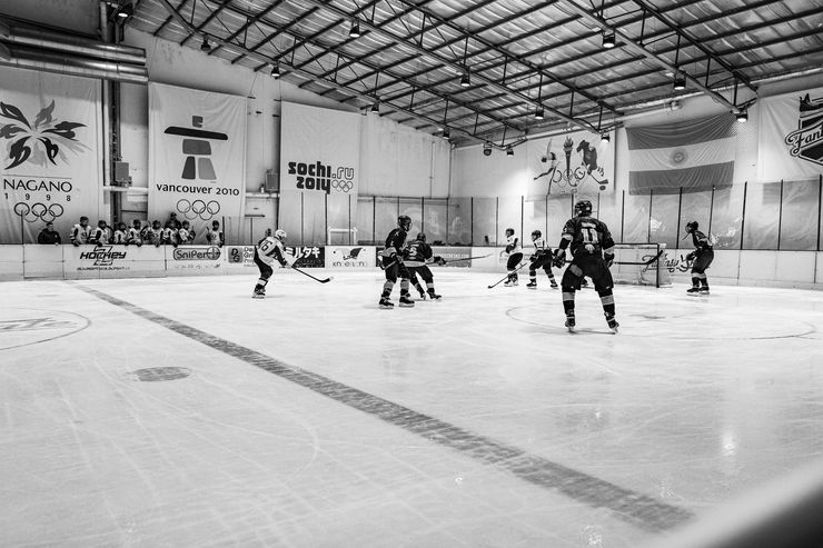 Adult Players Playing Hockey