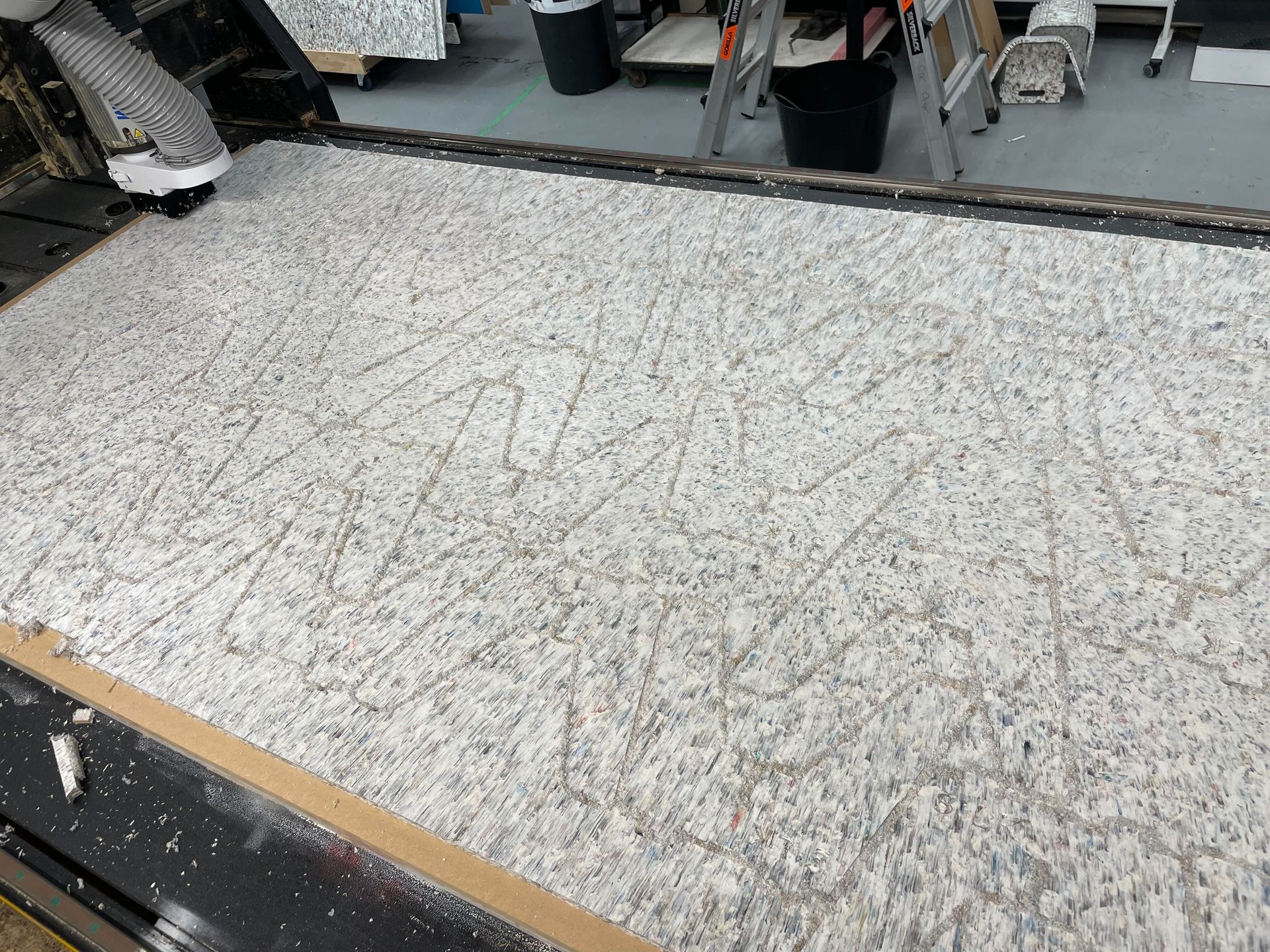 CNC machine cutting saveBOARD sheet.