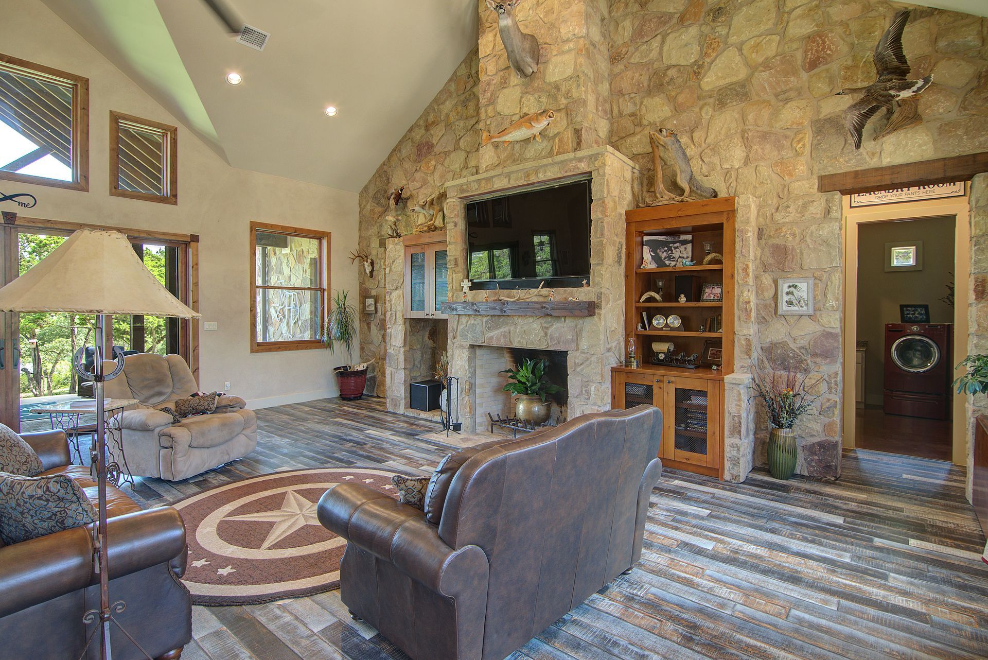A living room with a fireplace and a couch