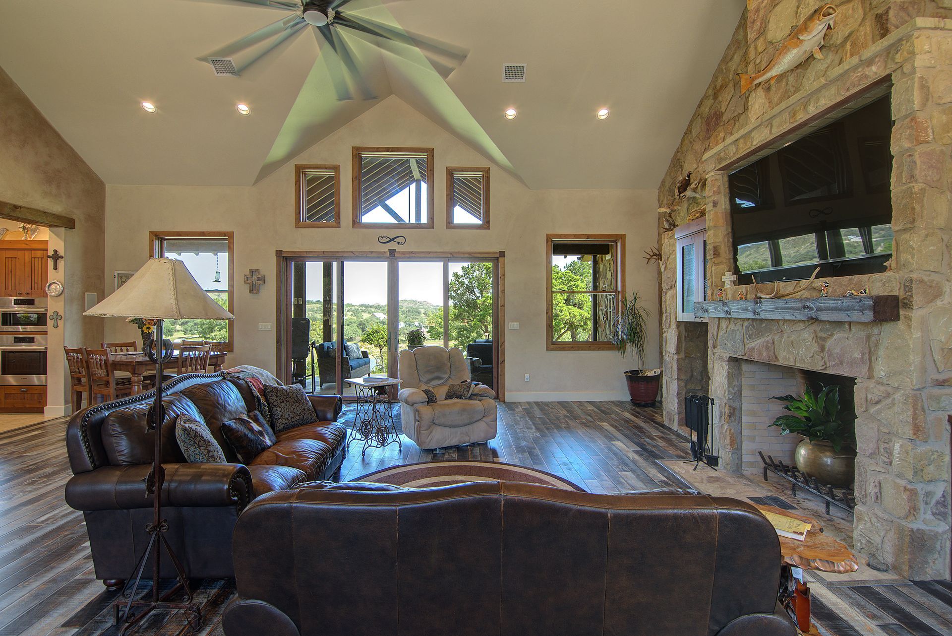 A living room filled with furniture and a fireplace.