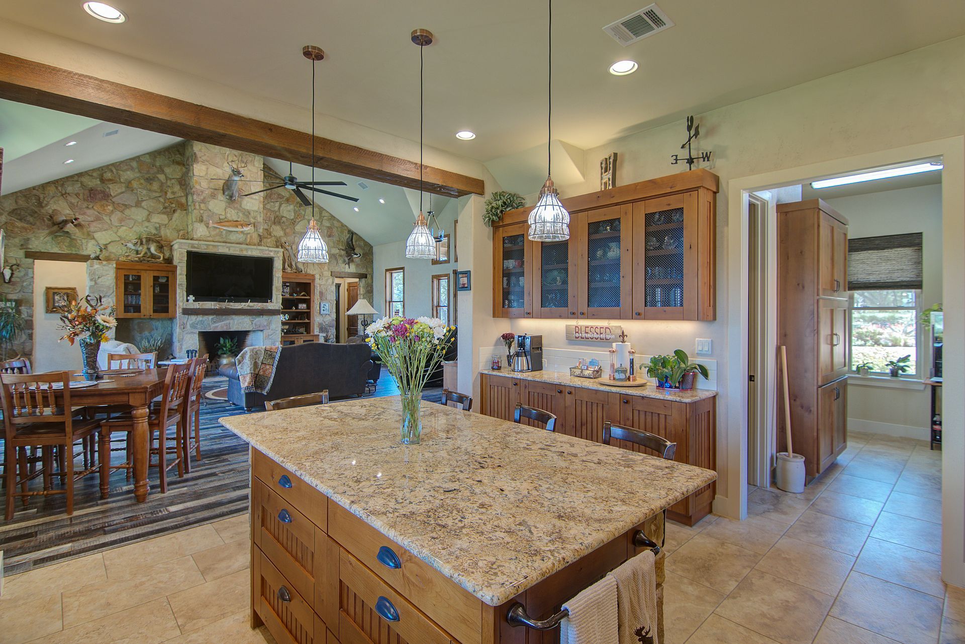There is a large island in the middle of the kitchen.