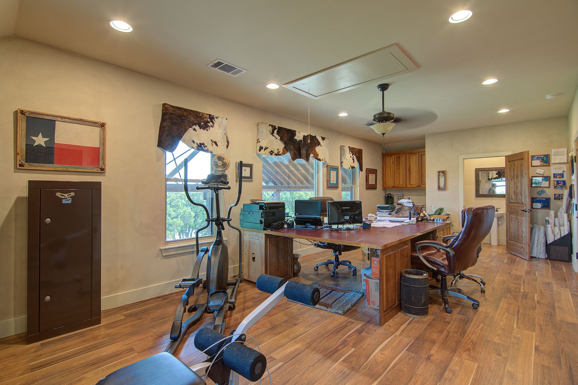 There is a row machine in the middle of the room.