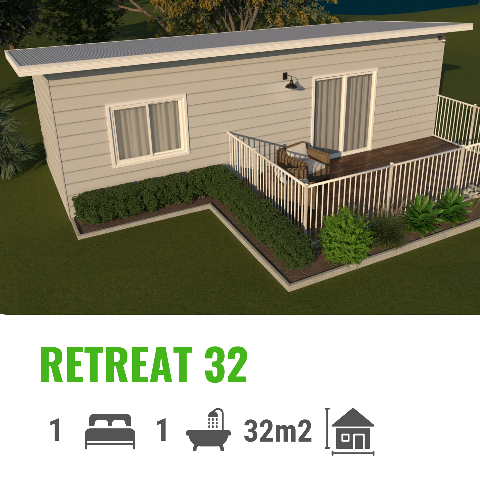 A small gray retreat building with one bedroom, a bathroom, and a deck, in a grassy setting.