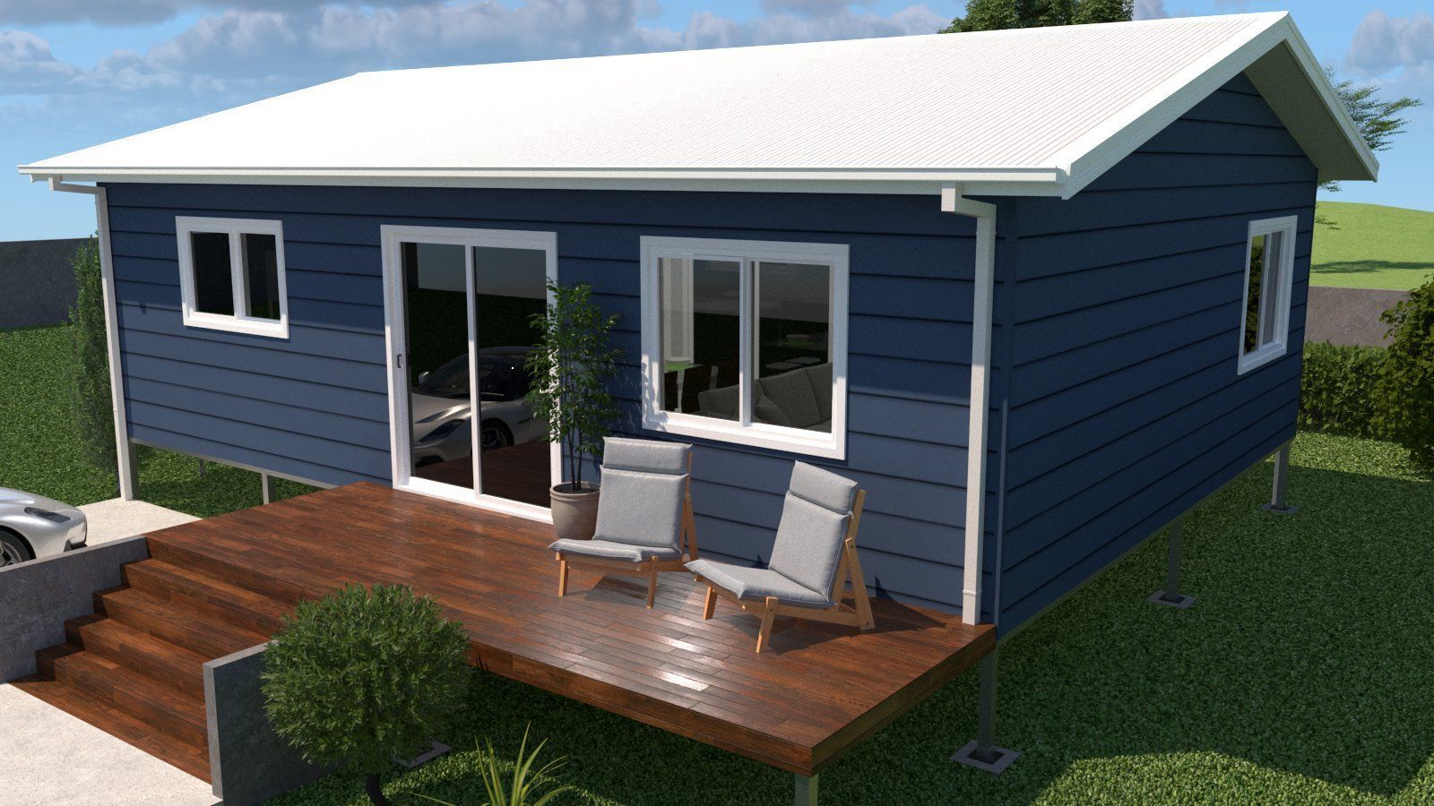 Blue house with white roof, wooden deck, two chairs.