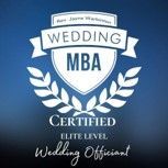 White “Wedding MBA Certified” badge with laurel wreath and “Elite Level Wedding Officiant” text in blue and silver