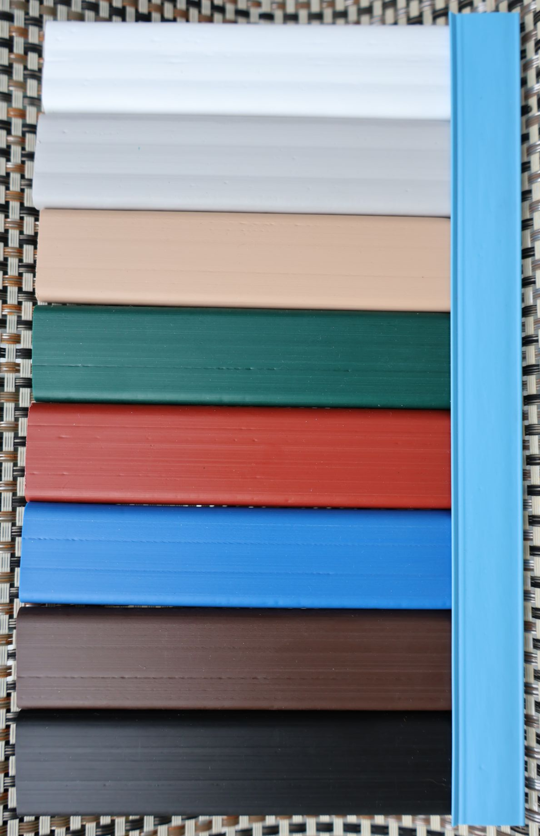 McConnie Fence offers black, brown, blue, red, green, tan, gray, white, and additional colored privacy slat options