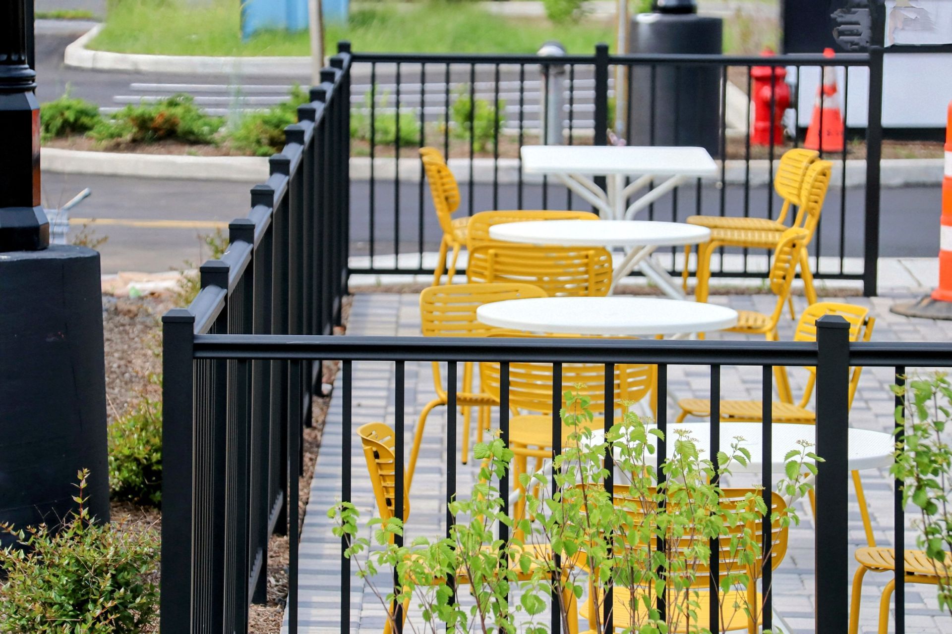 Black commercial 2-rail aluminum fence installation in Tampa, FL