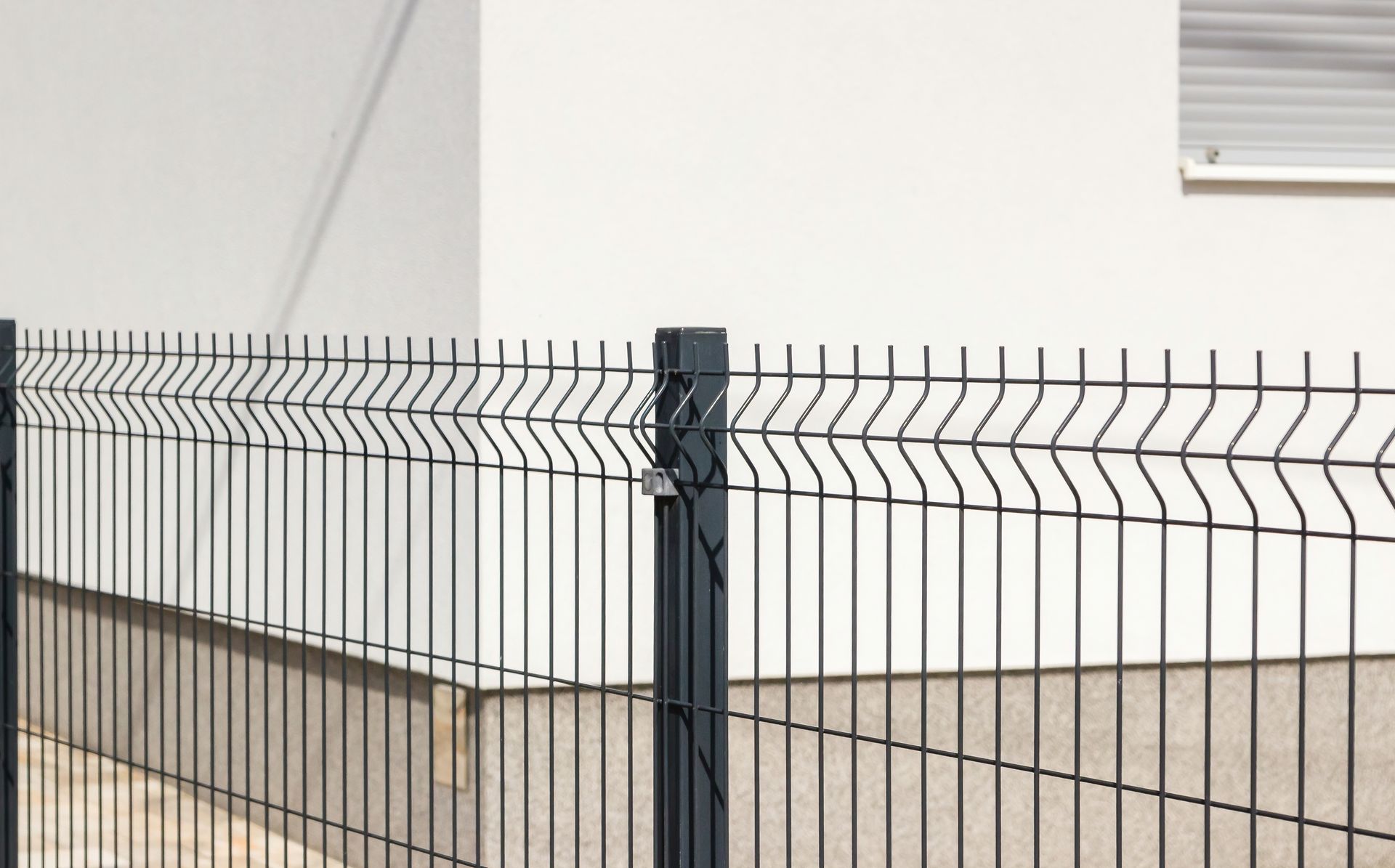 Black commercial aluminum welded wire fence installation in Tampa, FL