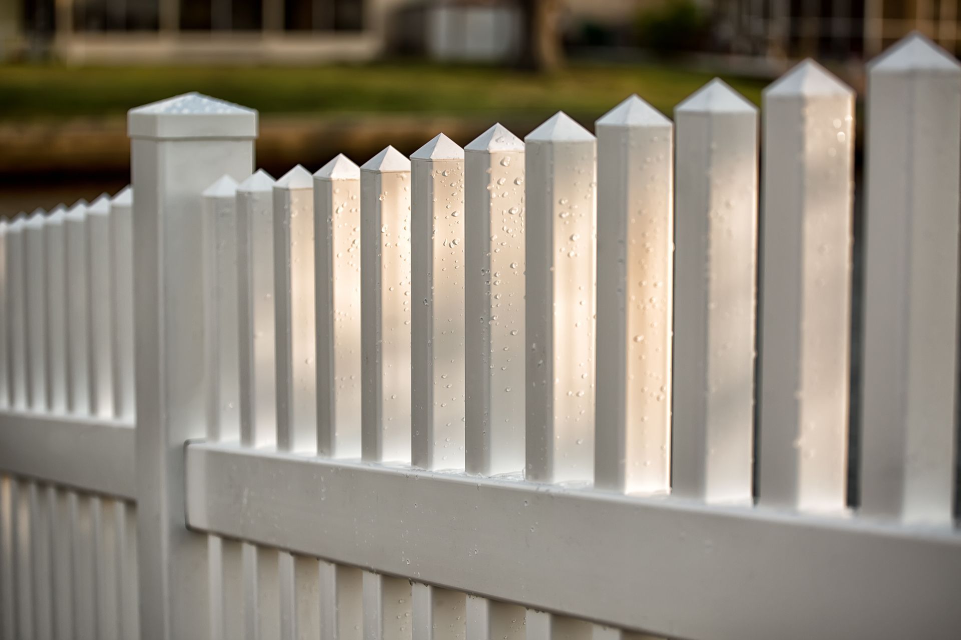 White commercial vinyl picket fence installation in Tampa, FL