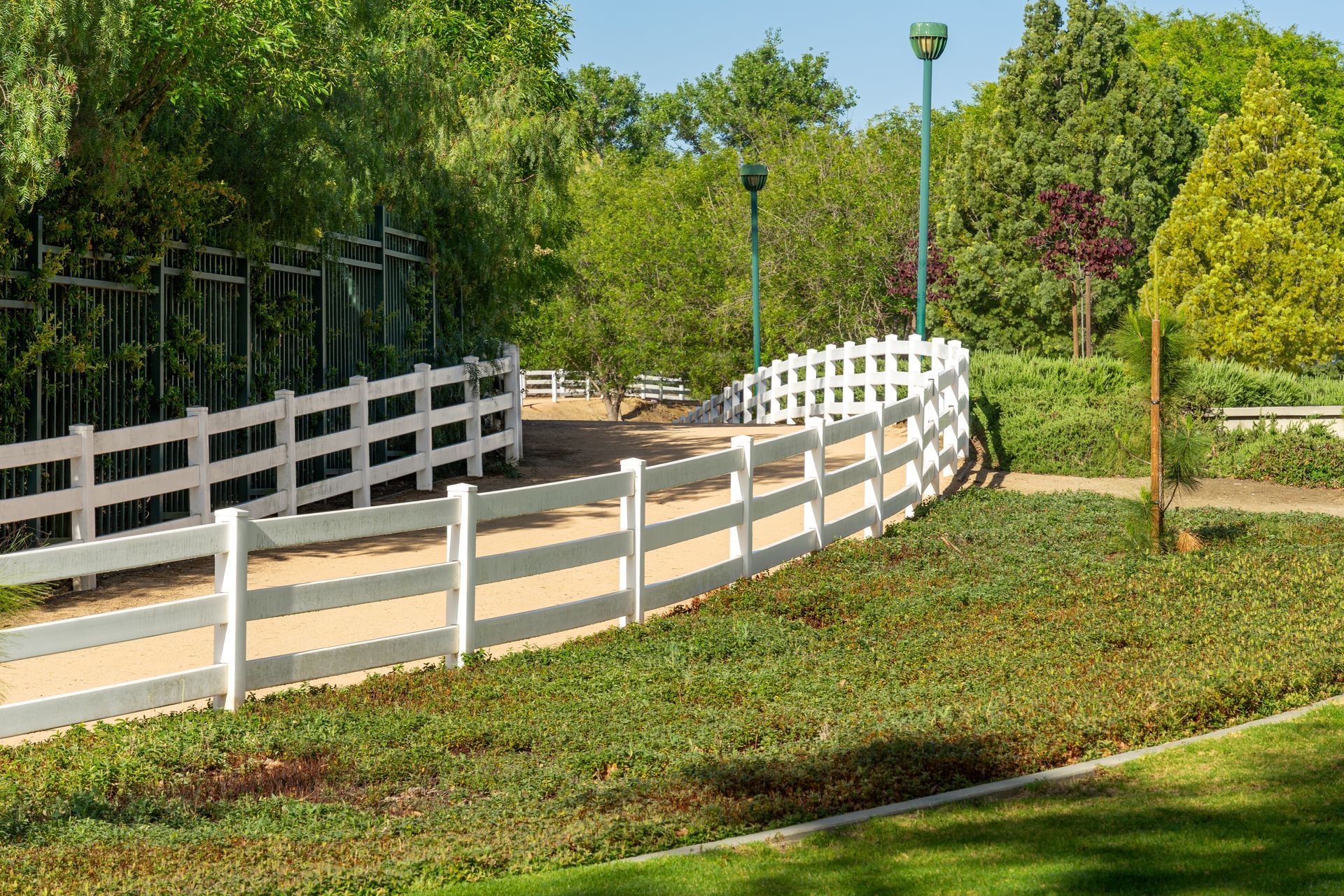 Commercial vinyl post and rail fence installation in Tampa, FL