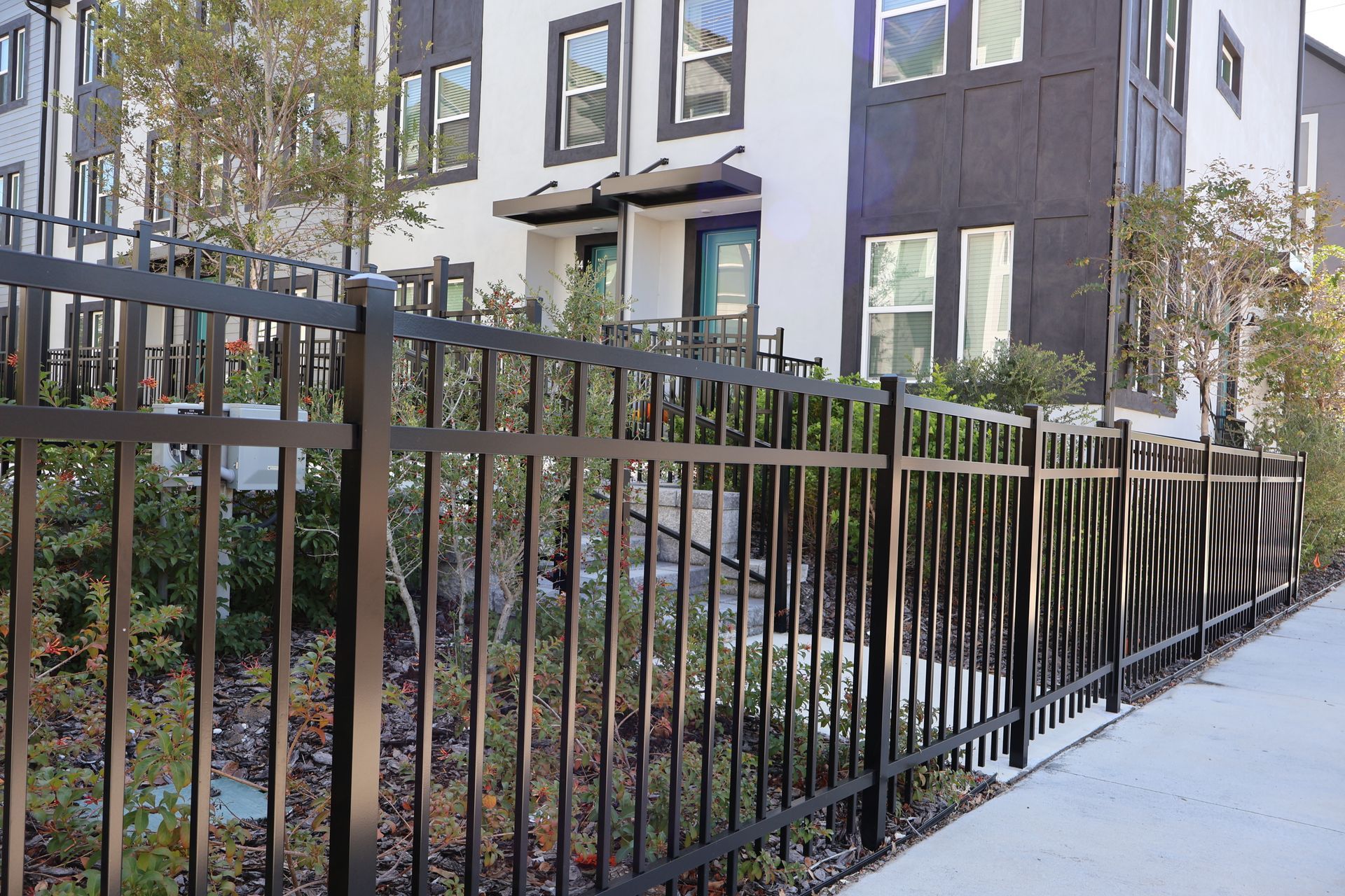 Commercial aluminum fence installation around an apartment complex in Tampa, FL