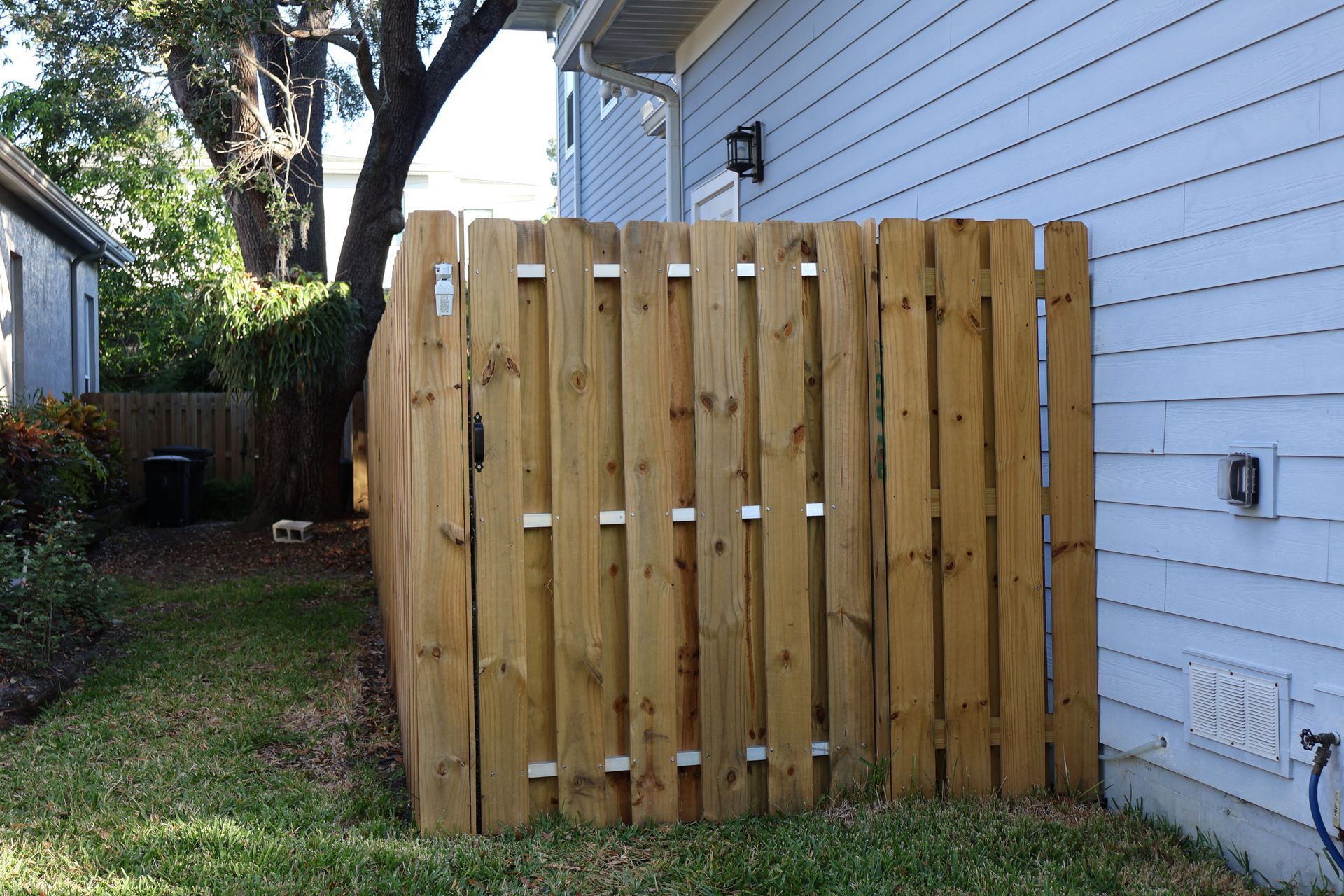 Residential wood gate installation in Tampa, FL