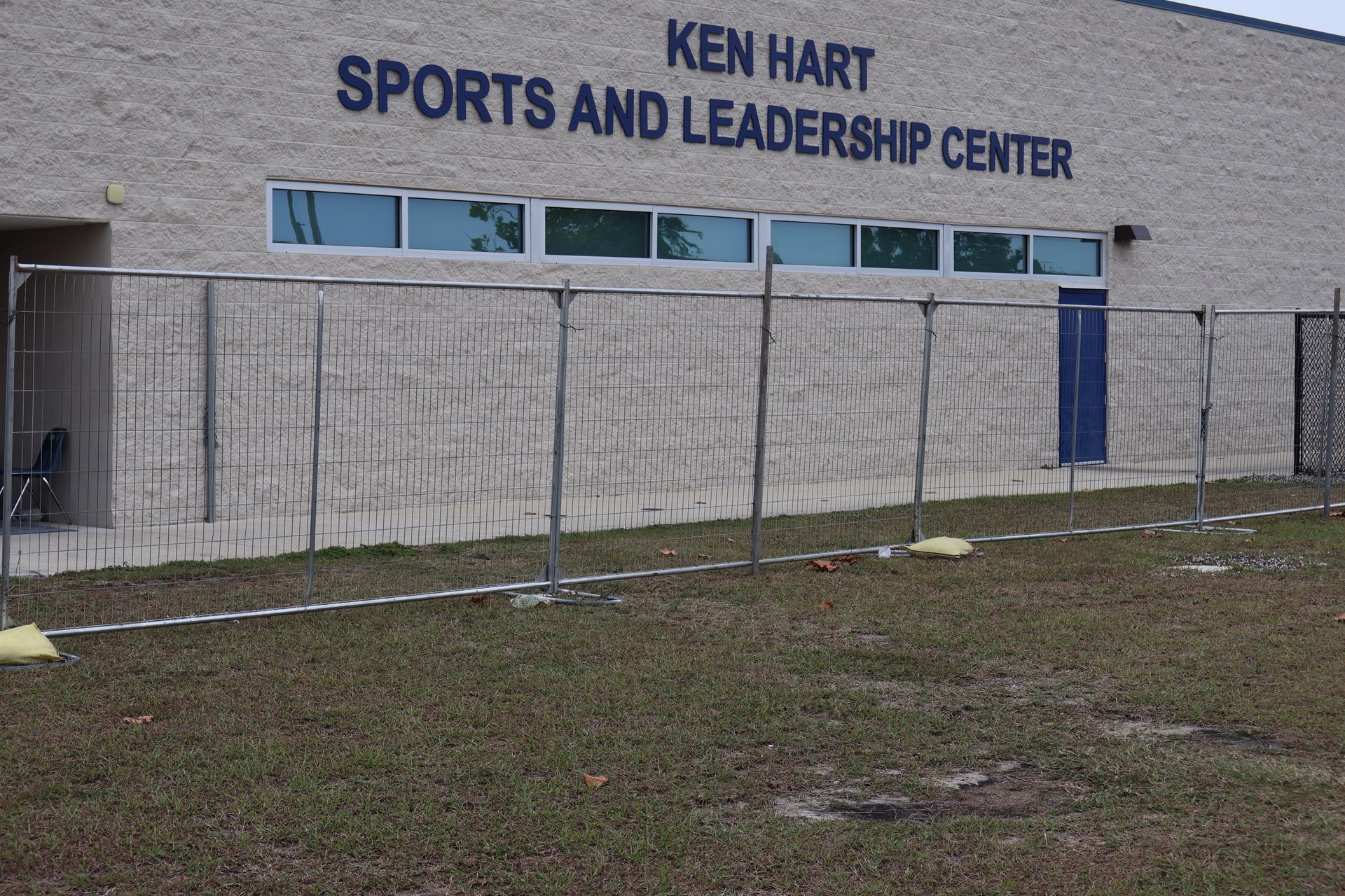 Commercial temporary fencing around Ken Hart Sports and Leadership Center at Alonso High School in Tampa, FL