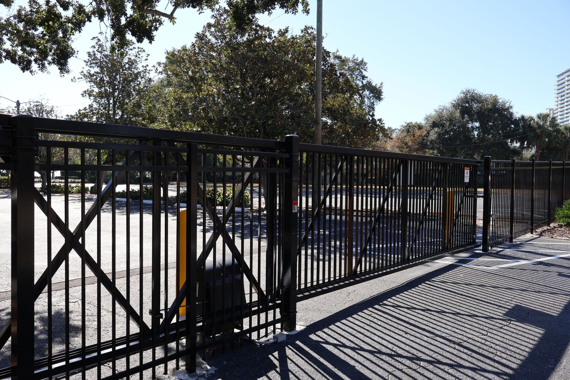 Commercial aluminum/steel automated gate installation in Tampa, FL