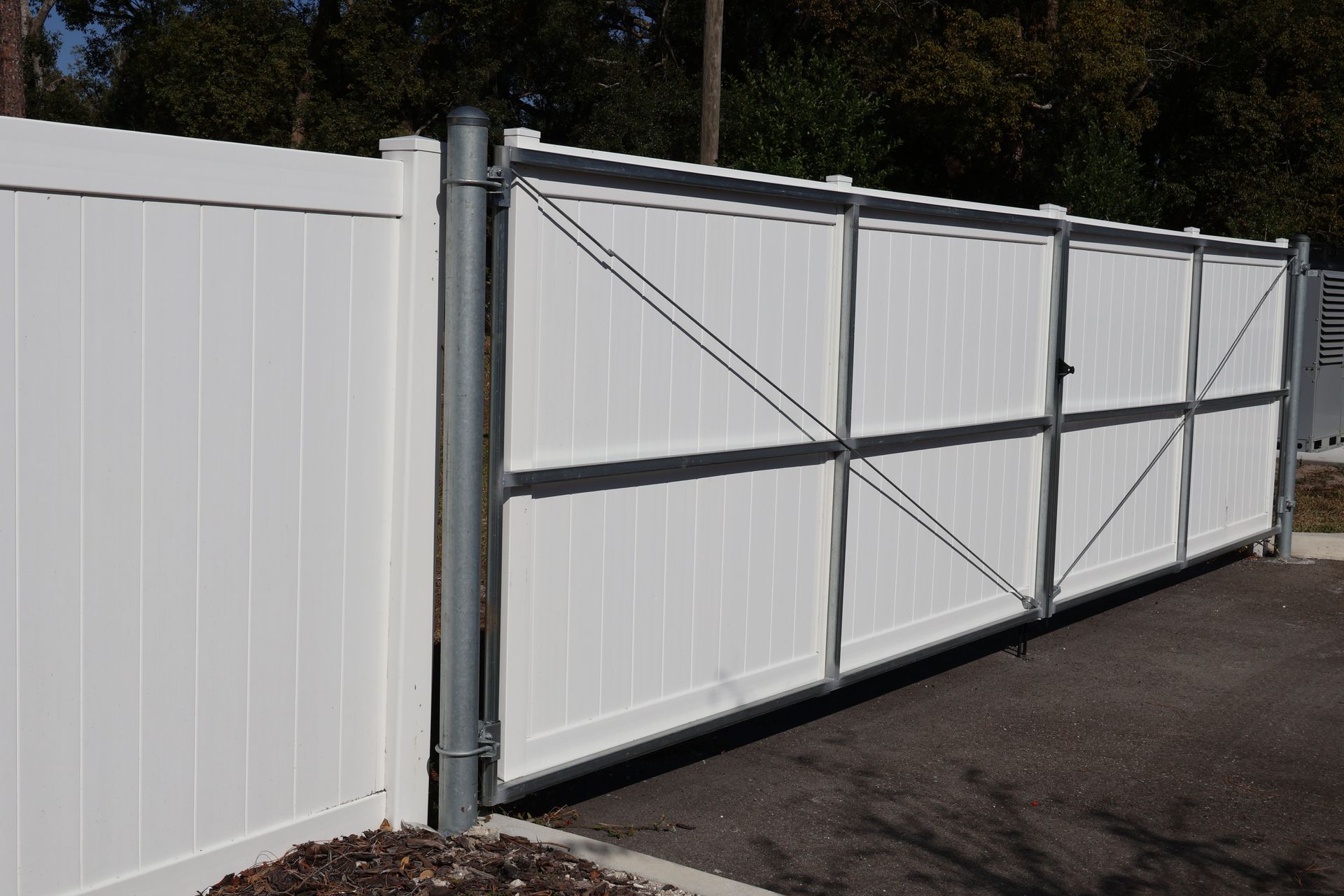 Commercial vinyl/PVC gate installation in Tampa, FL