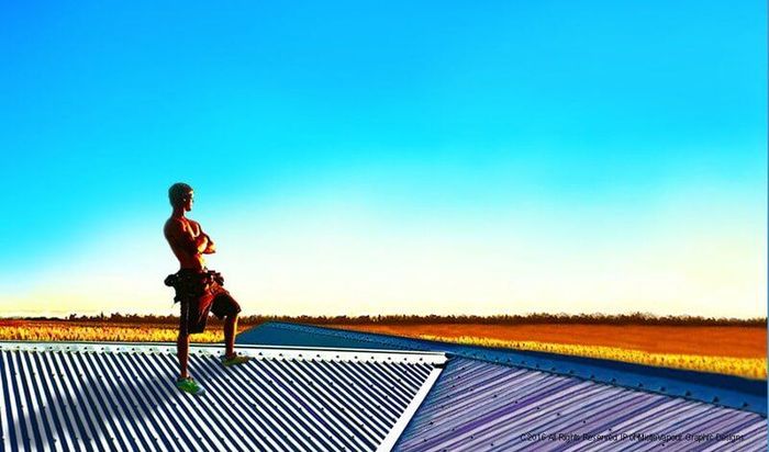 Man Standing On Top Of The Roof — Roofing Services in Rockhampton, QLD Man Standing On Top Of The Roof — Roofing Services in Rockhampton, QLD