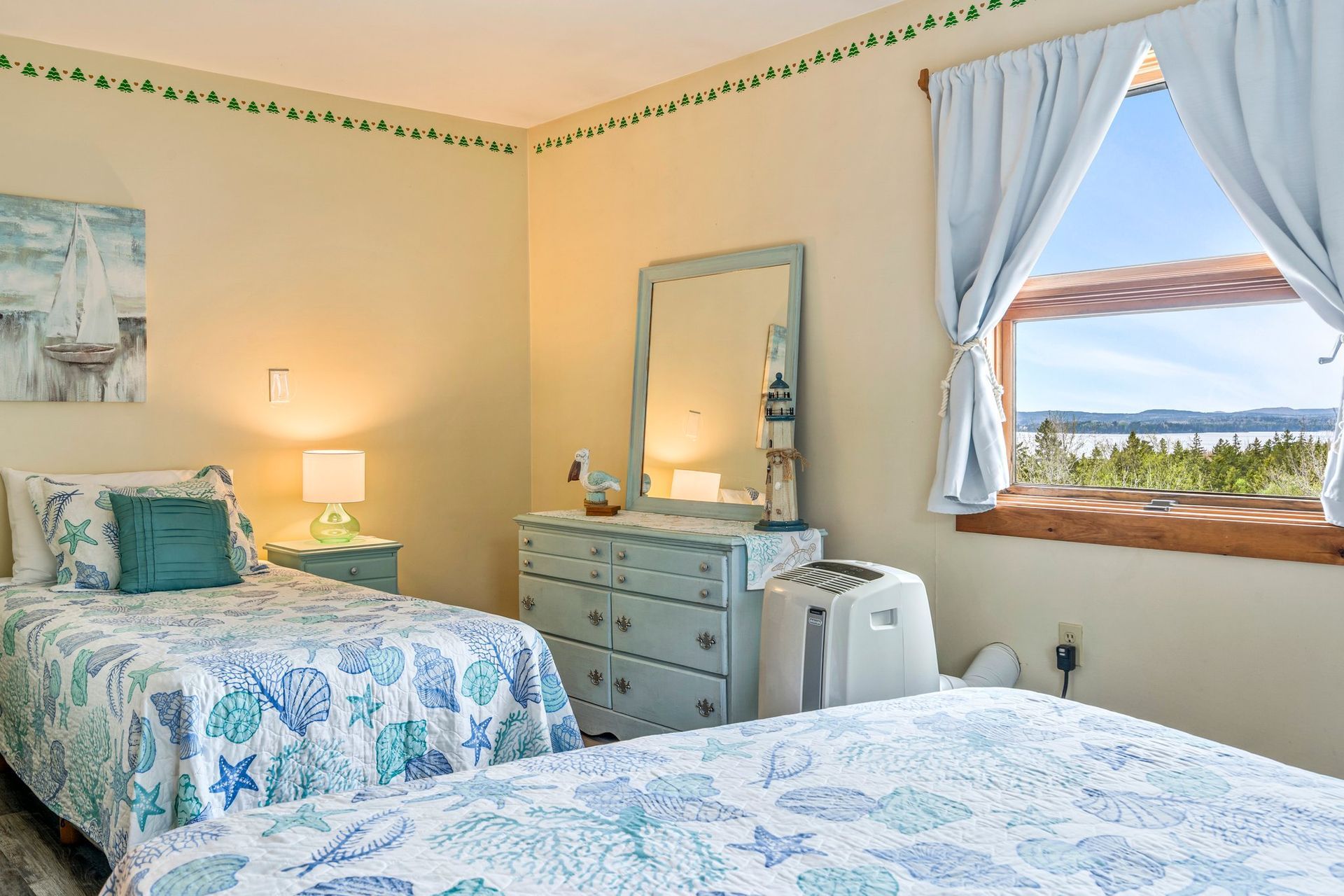 Inn room with a nautical theme overlooking Frenchman Bay, Mount Desert Island, and Acadia National Park.