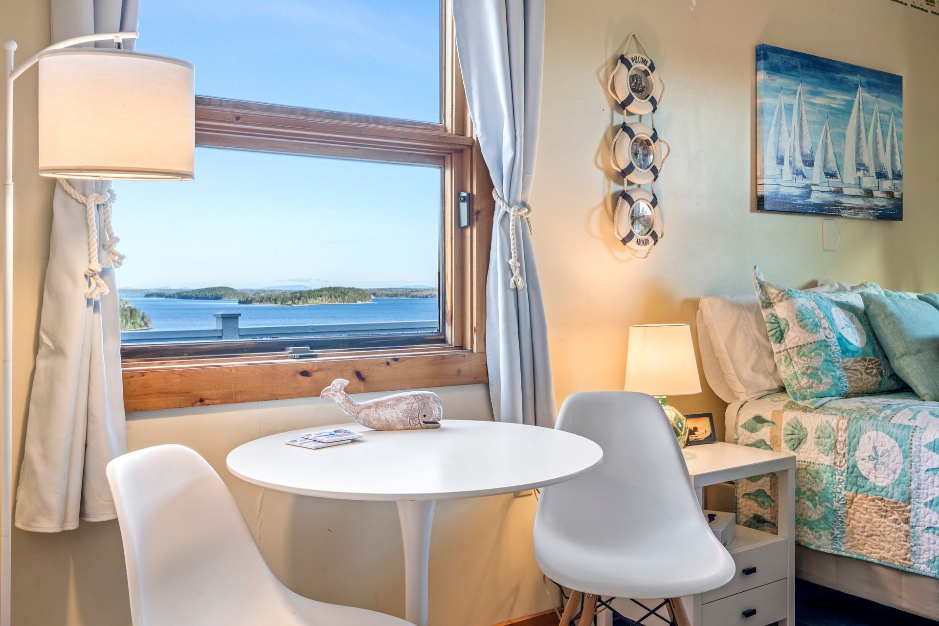 Stay in Oceanview Room at the Bluff House Inn with magical sunset ocean views over Frenchman Bay and Acadia National Park.