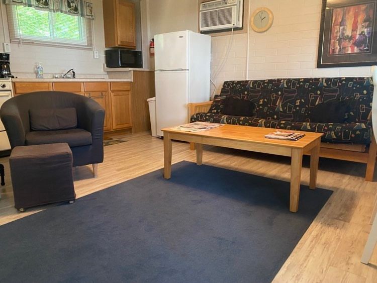 A living room with a couch and a coffee table