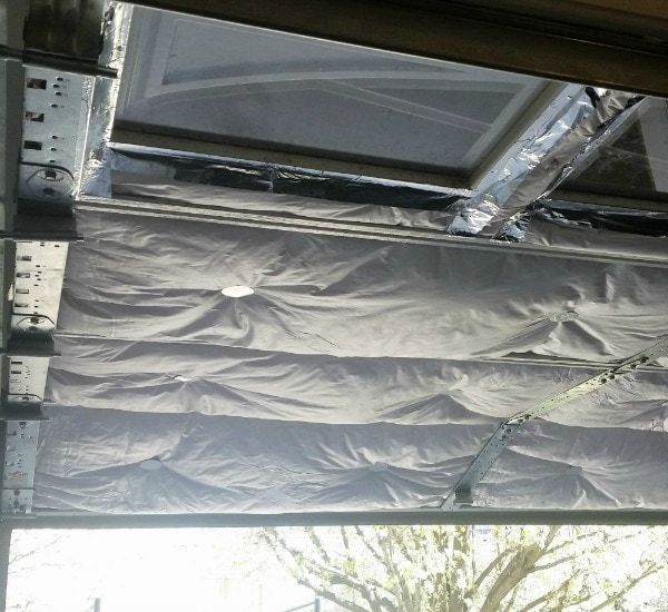 a ceiling with a lot of insulation on it