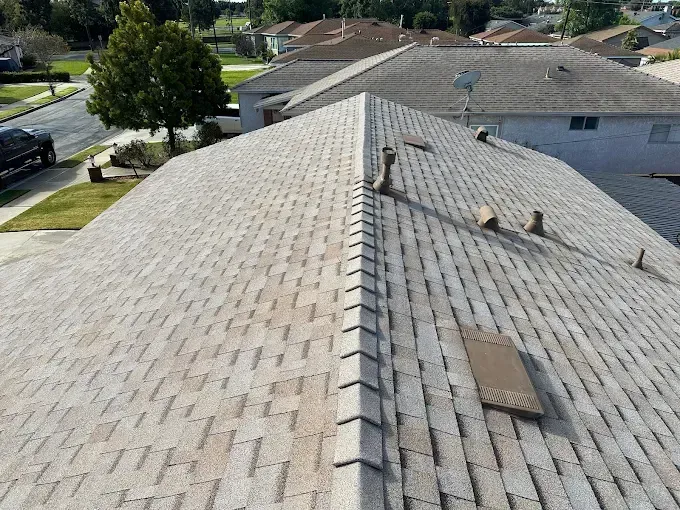 Residential asphalt shingles roofing guide for light-colored shingled roof in Norwalk, CA.