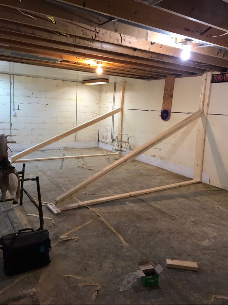 A room with a lot of wooden beams in it.