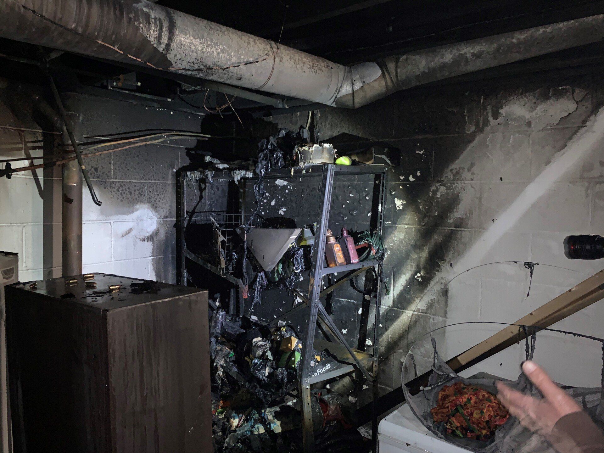 A corner cabinet affected by the fire.
