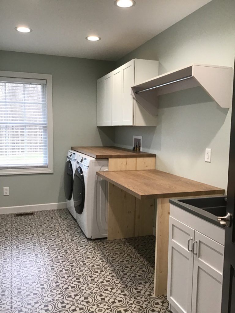 Laundry room and countertops fully restored from the fire damage.
