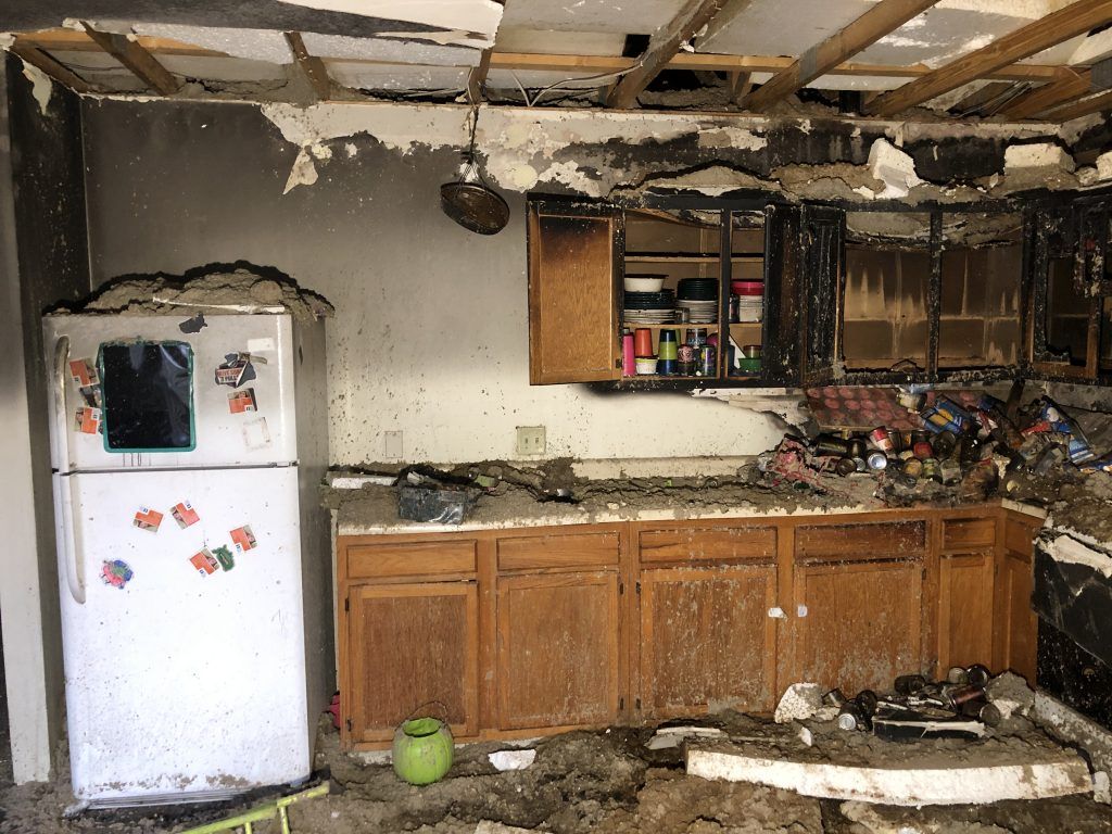Some post fire pictures of the damage in the kitchen and living room.