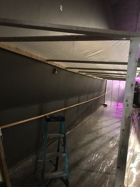 There is a ladder in the middle of the room.