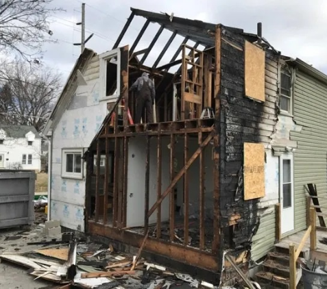 Home which has been partially destroyed by fire. 
