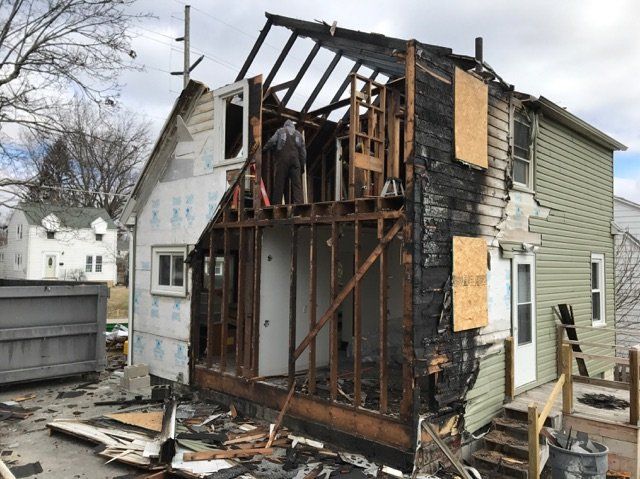 A house that has been partially destroyed by fire. 