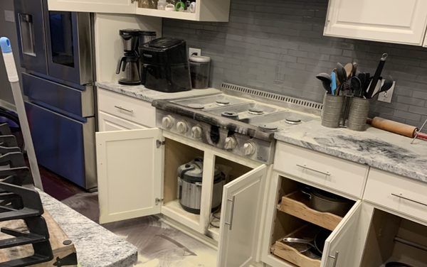 Residue all over the stove top from the gas malfunction.