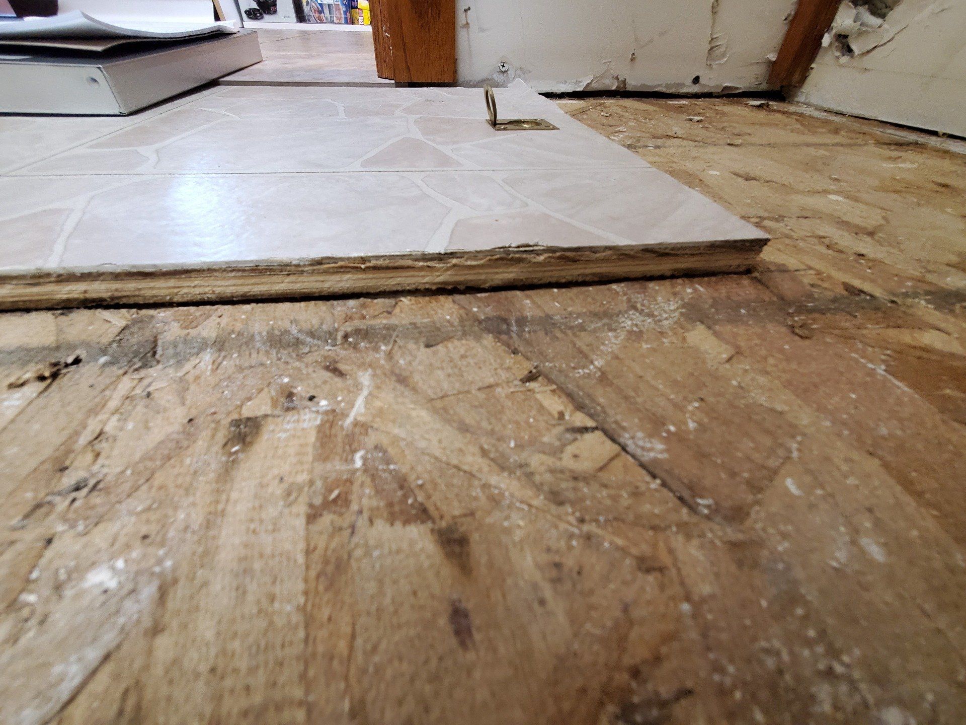 Floor with water damage. 