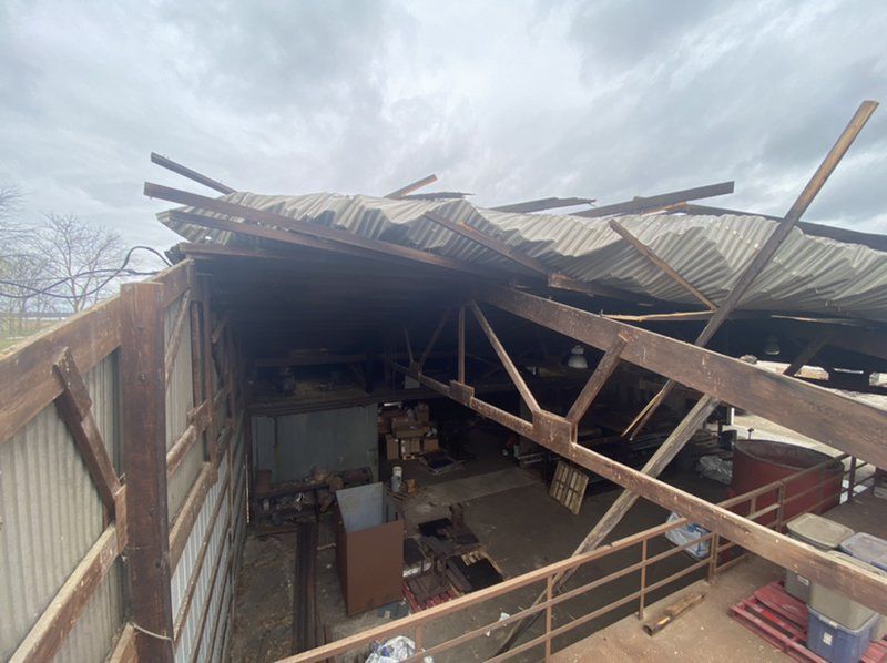 The wind ripped off this area of the roof.