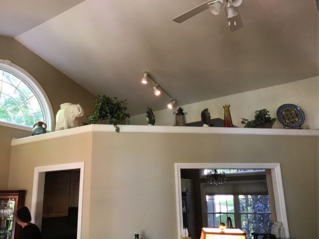 The high ceiling of the dining room and living room.