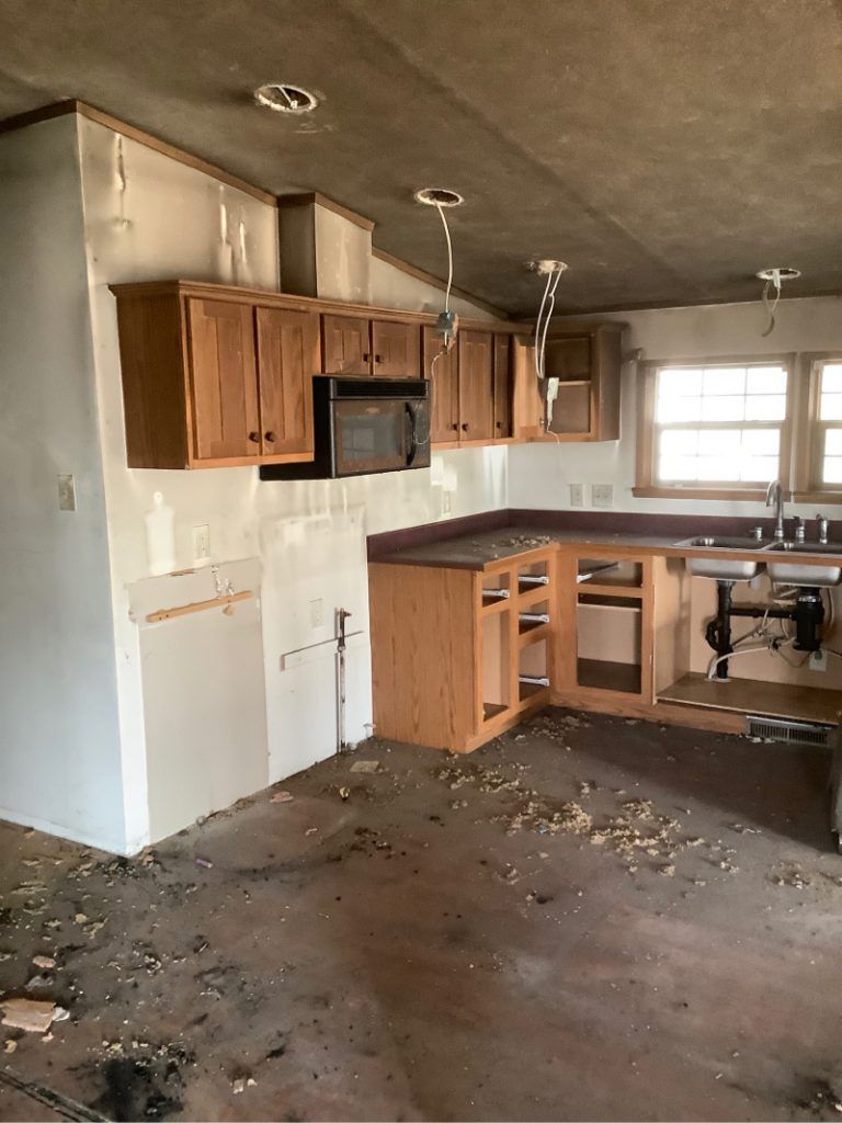 A kitchen that has been water damaged. 