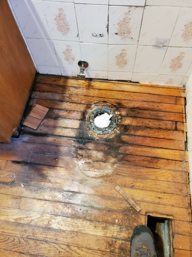 A water damaged wooden floor. 