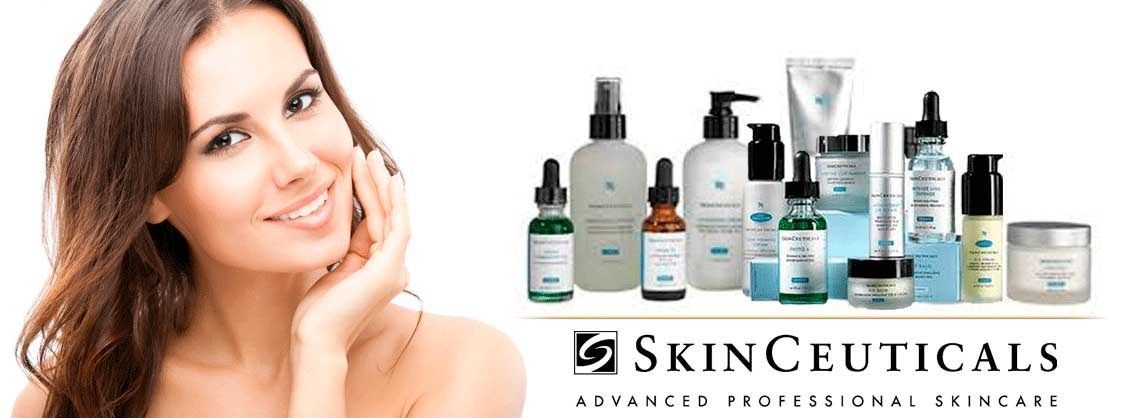 A woman is smiling in front of a banner for skinceuticals A woman is smiling in front of a banner for skinceuticals