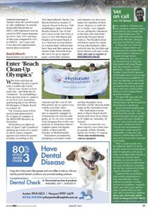 Article about a beach cleanup event, with a banner held by two people, and a dog advertisement.