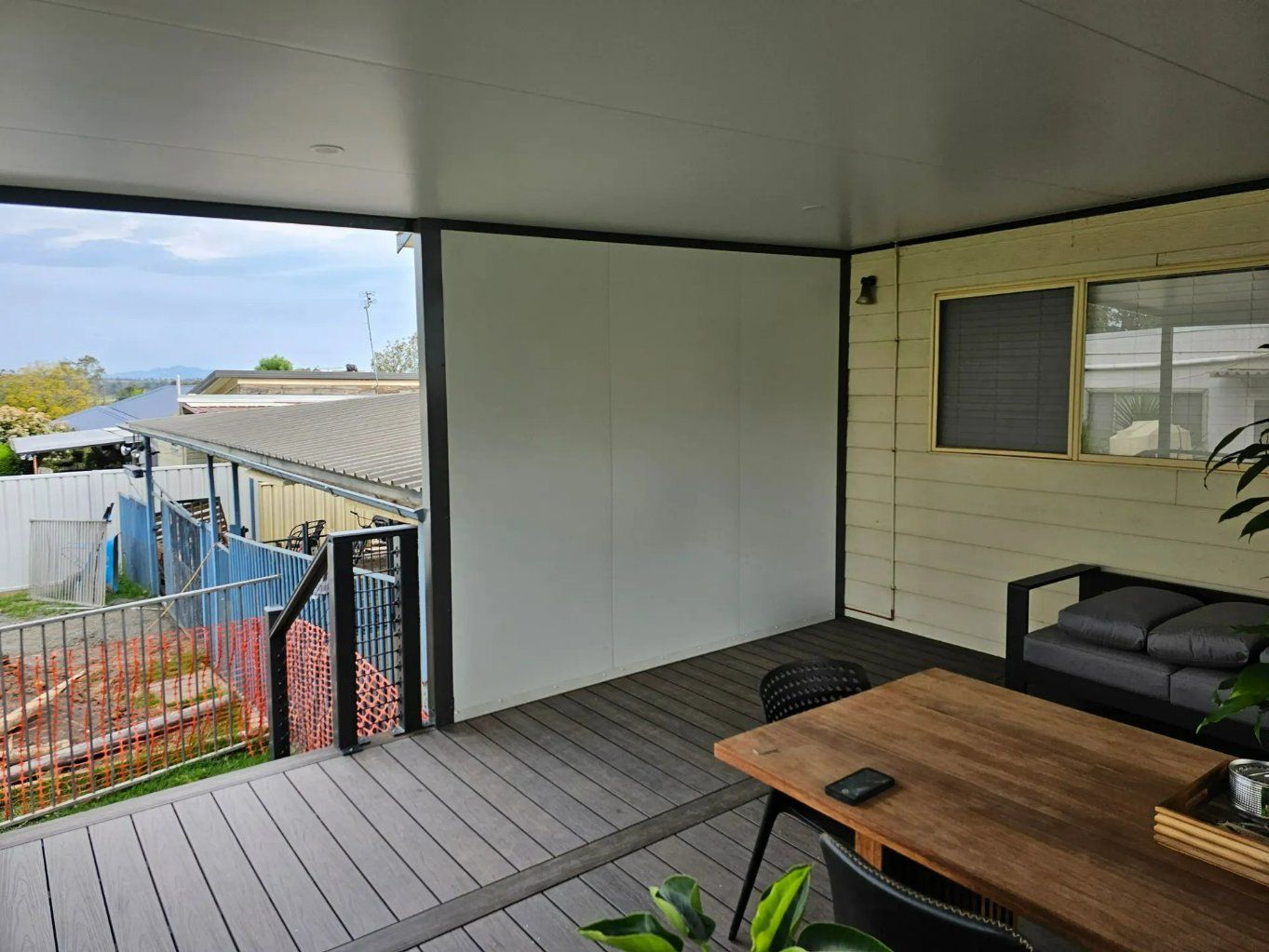 There is a table and chairs on the porch of a house — Nicho's Home Maintenance In Gunnedah, NSW