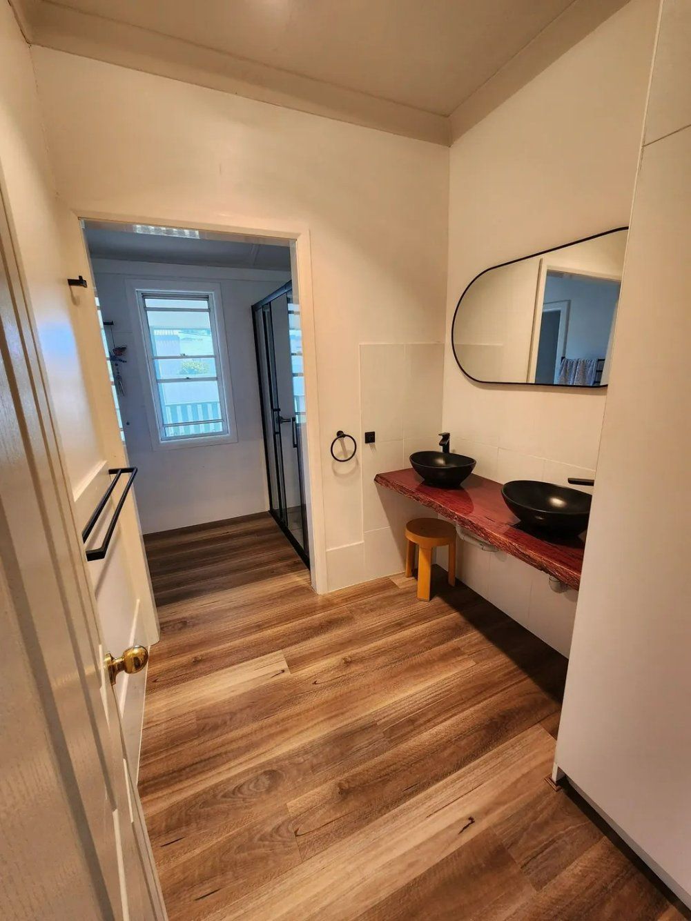 A Bathroom with Two Sinks and A Mirror on The Wall — Nicho's Home Maintenance In Tamworth, NSW