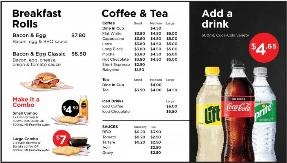 Fast-food breakfast menu with rolls, coffee and tea, and soft drink options with prices and drink bottles