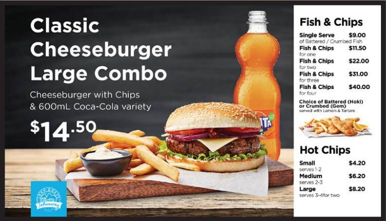 Classic cheeseburger large combo with fries, drink, and sides on a fast-food menu board