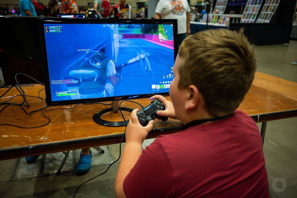 Kid gaming in the kid zone at the 2022 Capital City Comic Con event